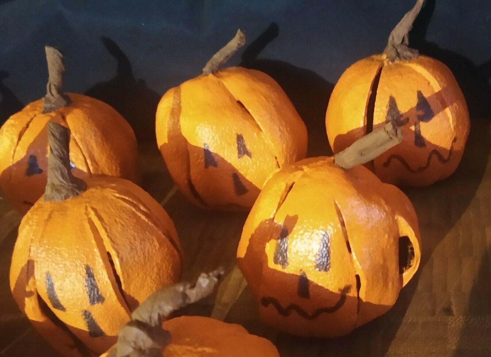 10-EACH, DRIED MINI PUMPKIN JACK O LANTERNS. HAND MADE FROM DRIED CLEMINTINES